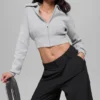 Giacca corta in maglia Scholar con zip integrale - Grigio melange sportivo