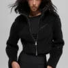 Giacca corta Sherpa con taglio obliquo - Nero