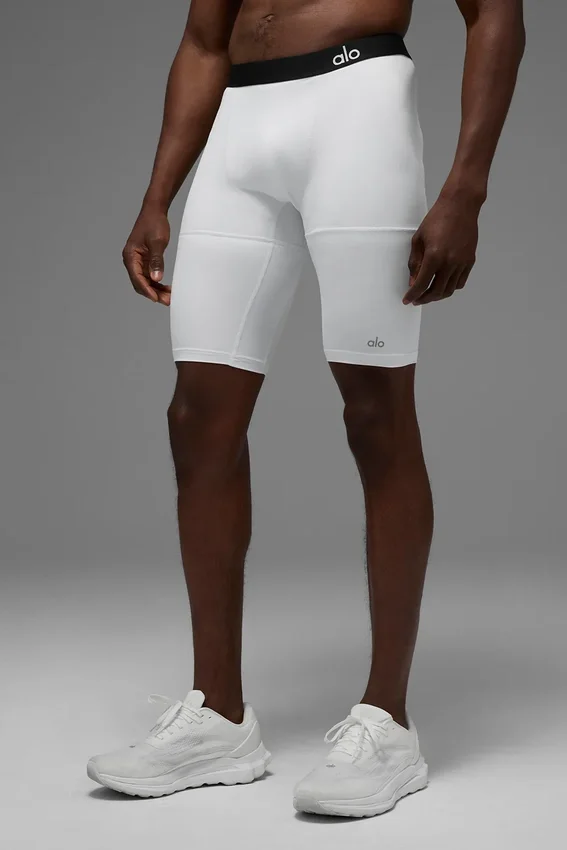 Pantaloncini a compressione Flight da 9" - Bianchi