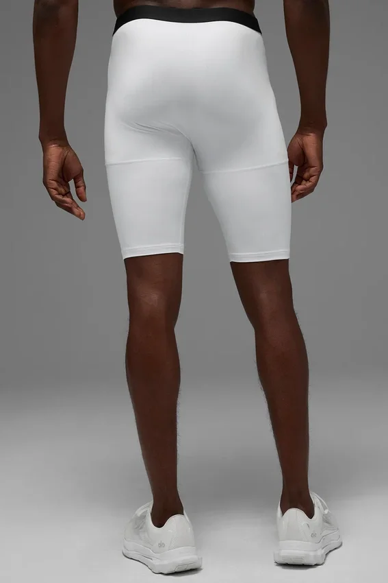 Pantaloncini a compressione Flight da 9" - Bianchi