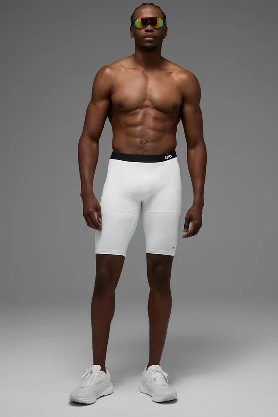 Pantaloncini a compressione Flight da 9" - Bianchi