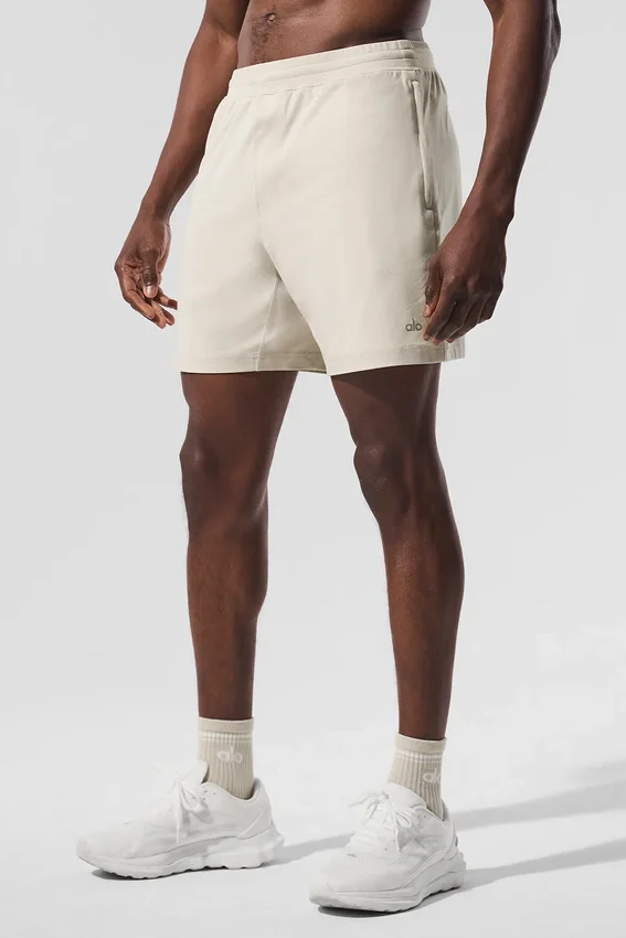 Pantaloncini Conquer React Performance da 7" - Bone