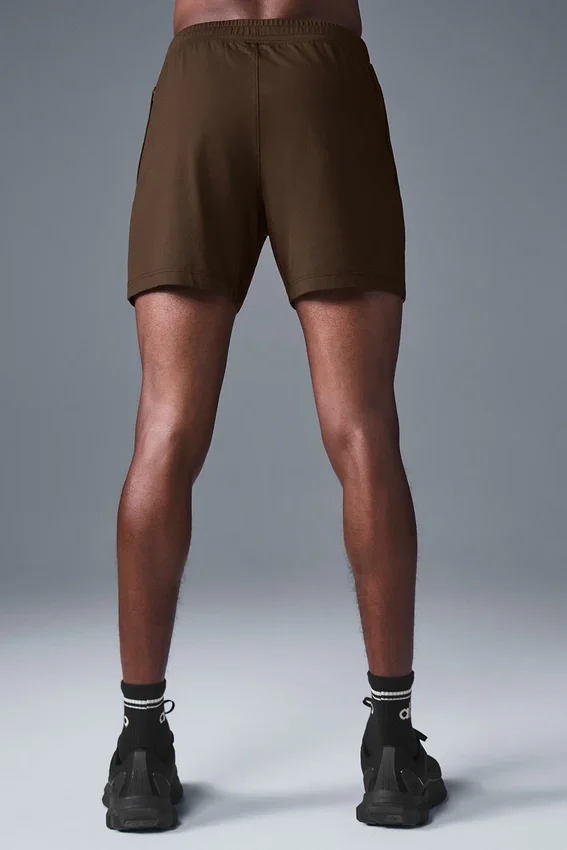 Pantaloncini Conquer React Performance da 7" - Espresso