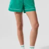 Pantaloncini da pista Motivate - Verde abete/Bianco