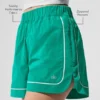 Pantaloncini da pista Motivate - Verde abete/Bianco