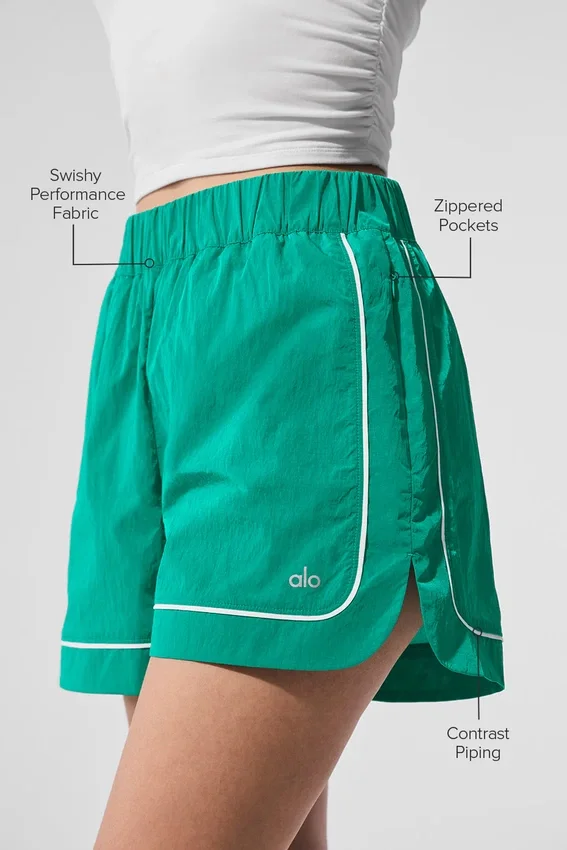 Pantaloncini da pista Motivate - Verde abete/Bianco