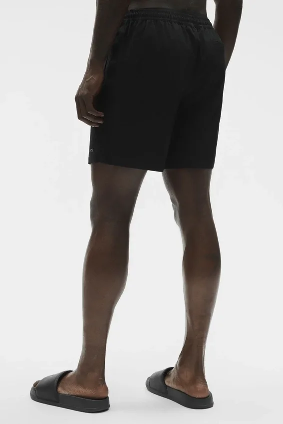 Pantaloncini da surf High Tide da 7" - Nero