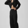 Pantaloni Cosmopolitan a vita media con bottoni a pressione - Nero
