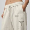 Pantaloni della tuta a gamba dritta gessati - Gessato color osso