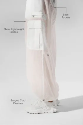 Pantaloni jogger a gamba larga Sheer Game Time – Bianco