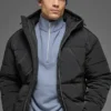 Piumino da palcoscenico con cappuccio in nylon stropicciato - Nero