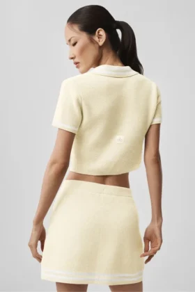 Polo corta in maglia tipo maglione Tennis Club – Avena/Bianco